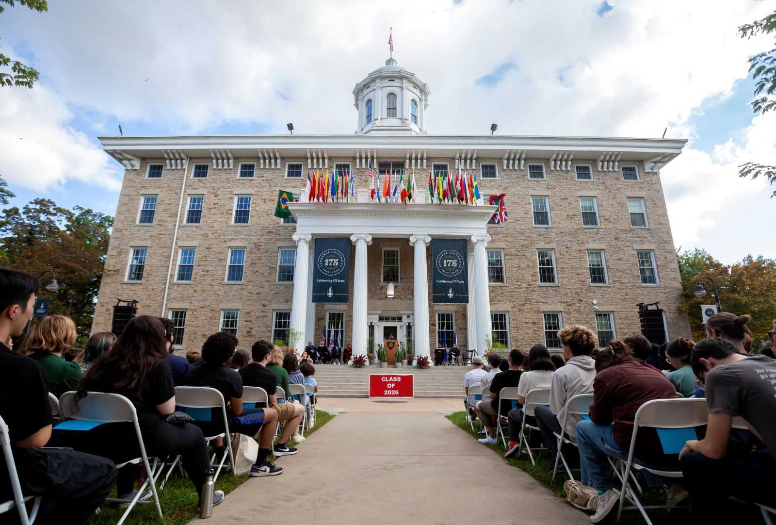Main Hall, with 175th anniversary banners and flags from around the world on display, served as the backdrop to the President's Welcome.
