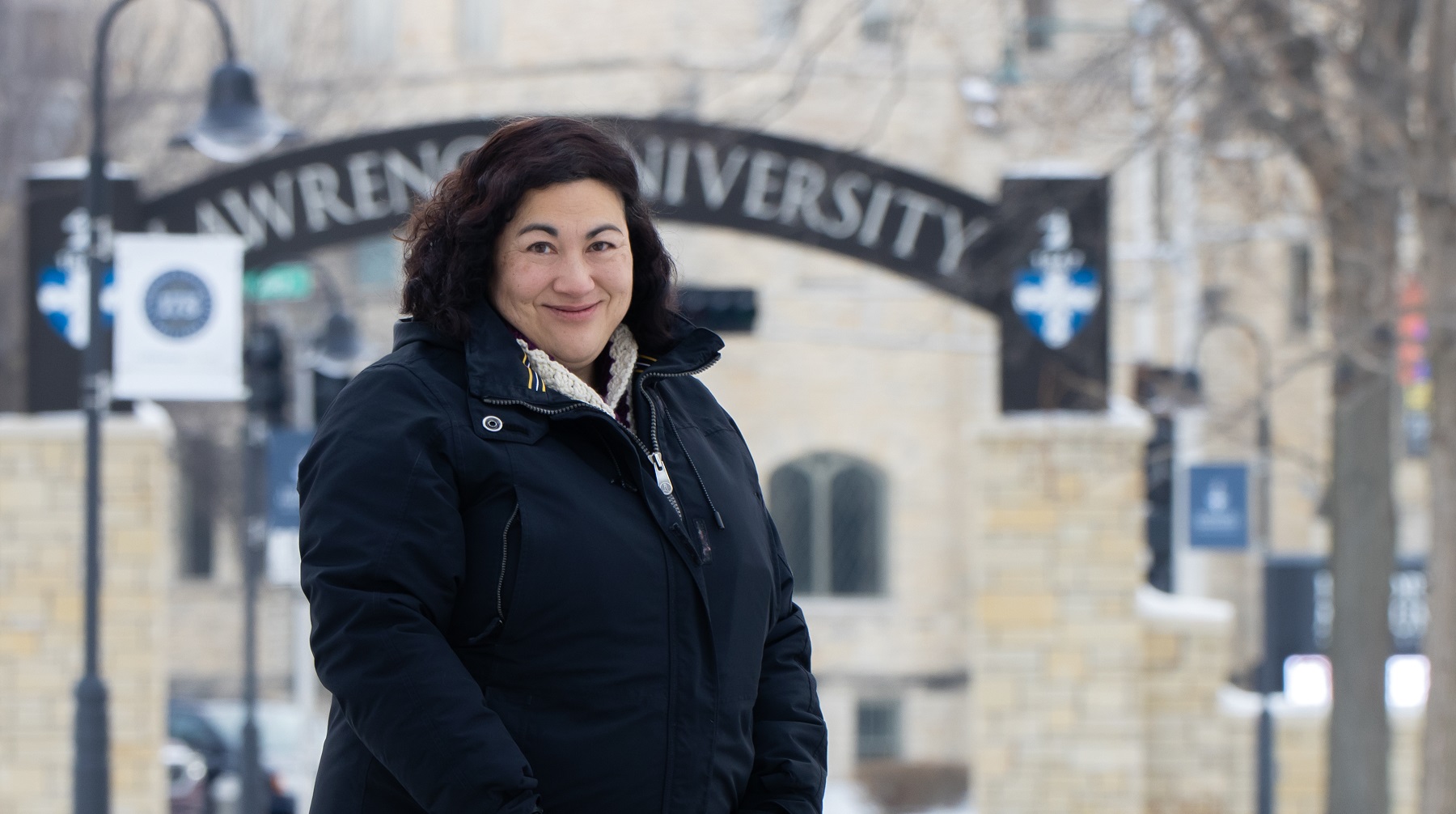 Monica Rico portrait with Lawrence Arch in background.