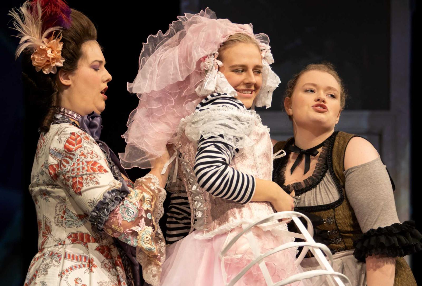 During rehearsals for the scene in the opera, Marriage of Figaro, where Countess Rosina dresses Cherubino.