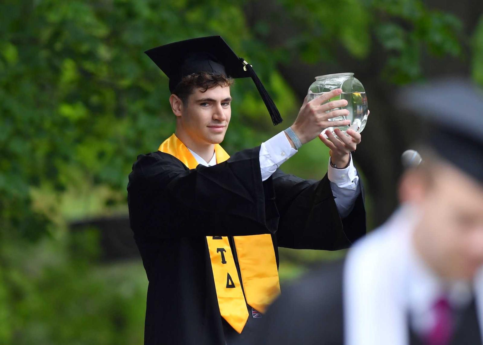 George Mavrakis brought a fish bowl with him to Commencement in 2019.