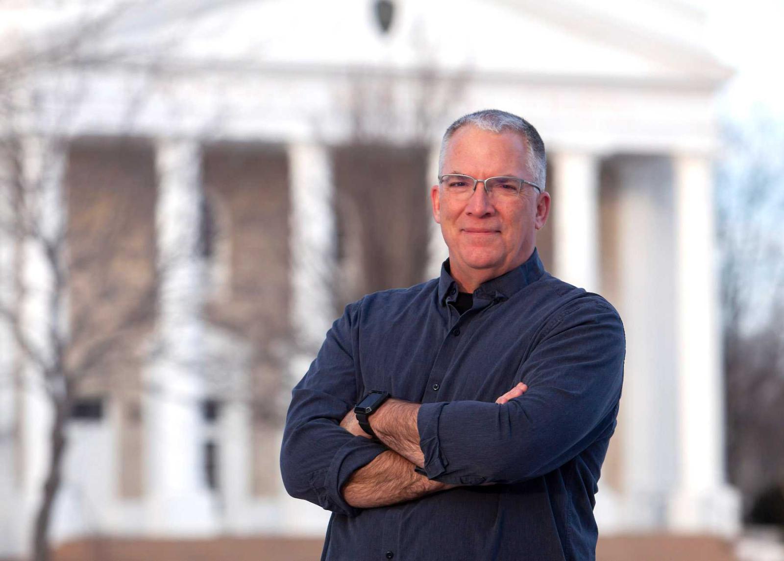 Andrew Mast poses for a portrait on Main Hall Green.
