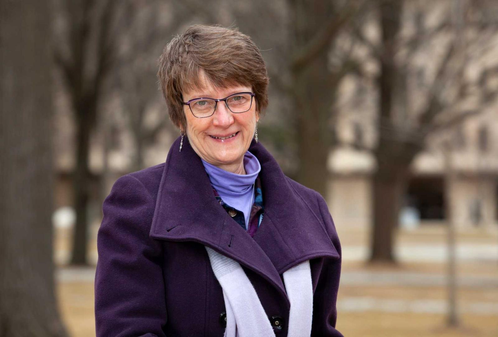 Beth De Stasio poses for a portrait on Main Hall Green.