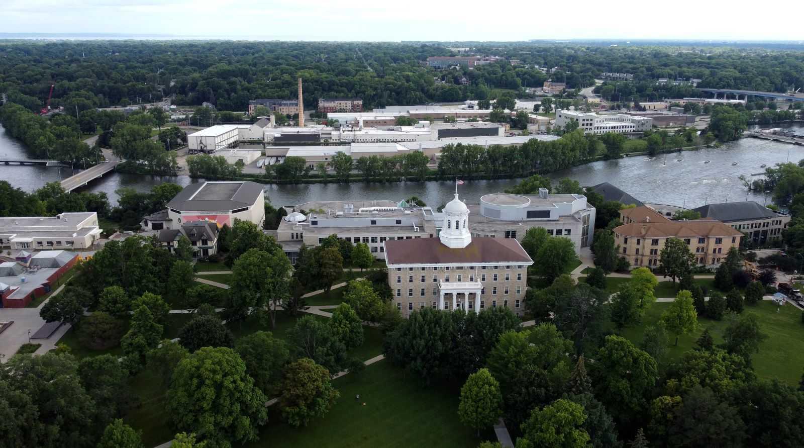 Aerial photo of Lawrence campus with Fox River in background.
