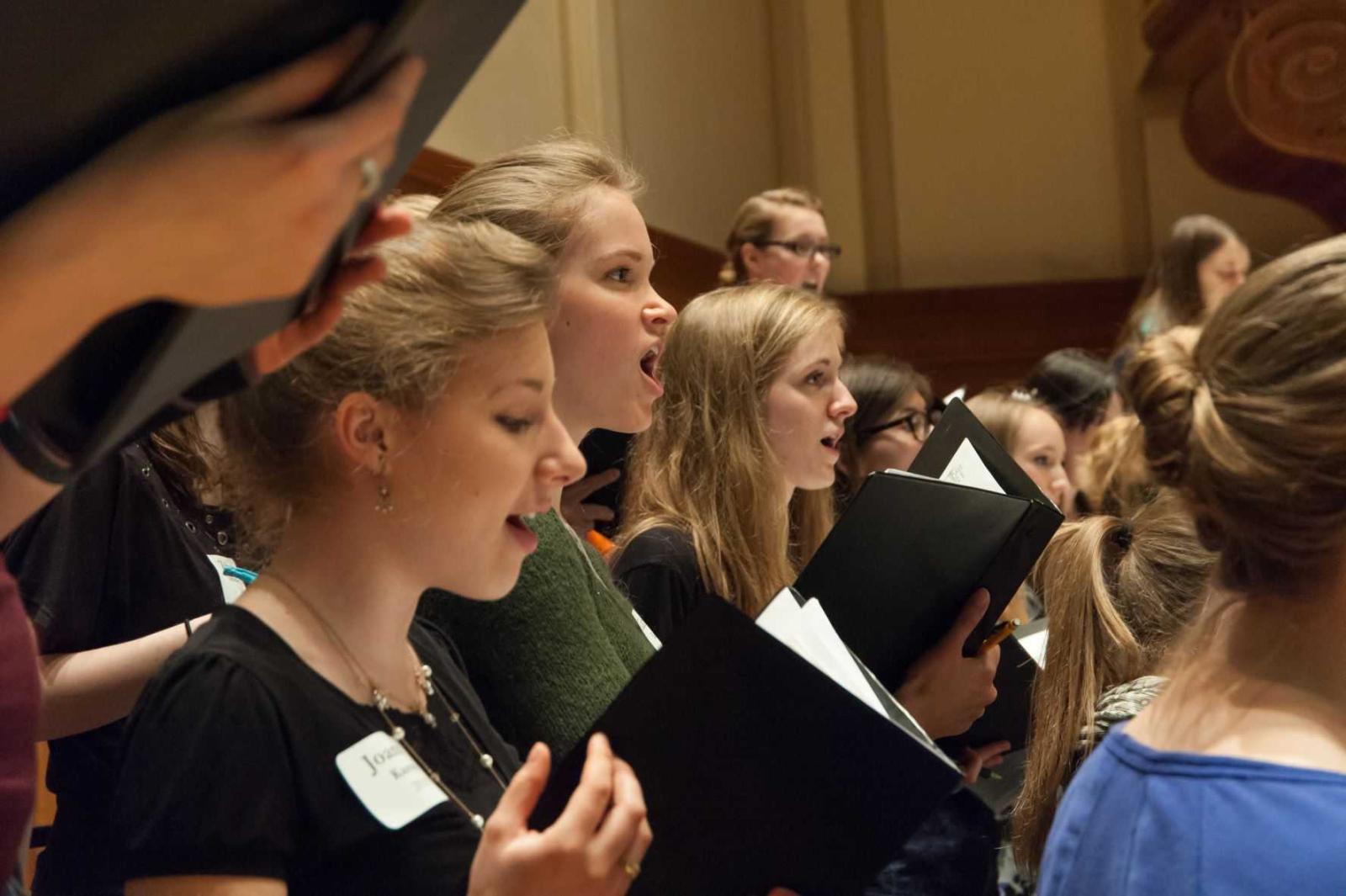 Girl Choir alumnae are seen singing during the 25th reunion weekend in 2016.