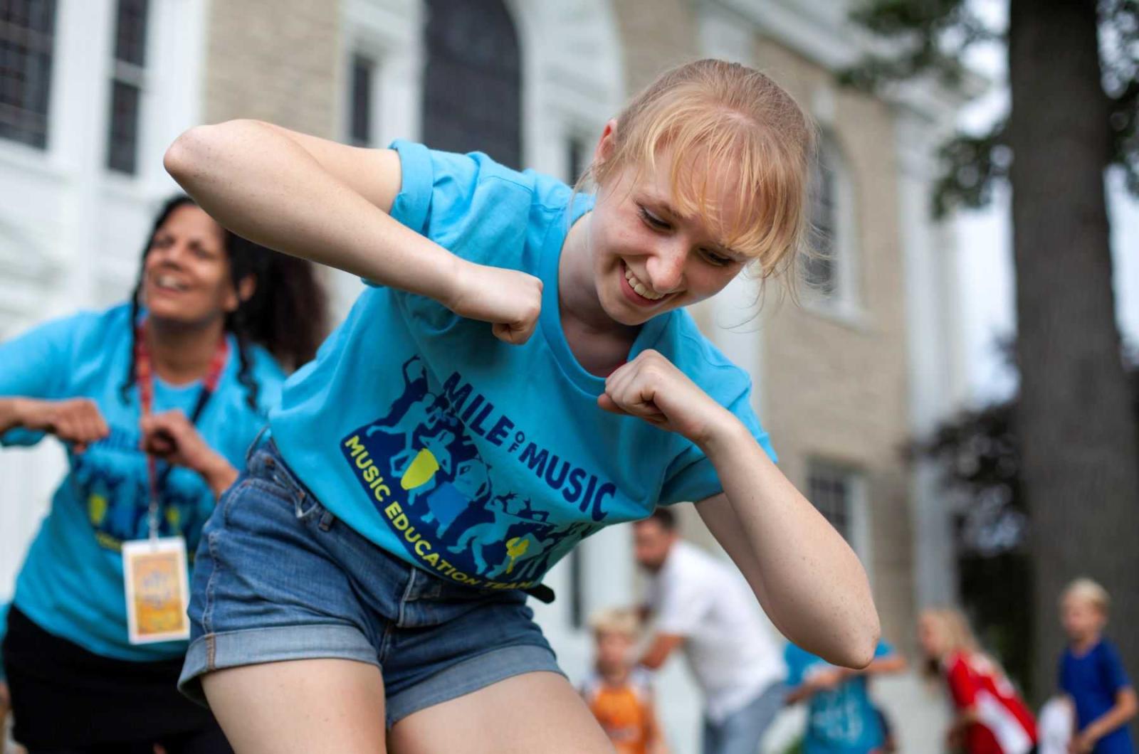 Mindara Krueger-Olson leads a Ghanaian Drumming & Dancing session during the 2021 Mile of Music.