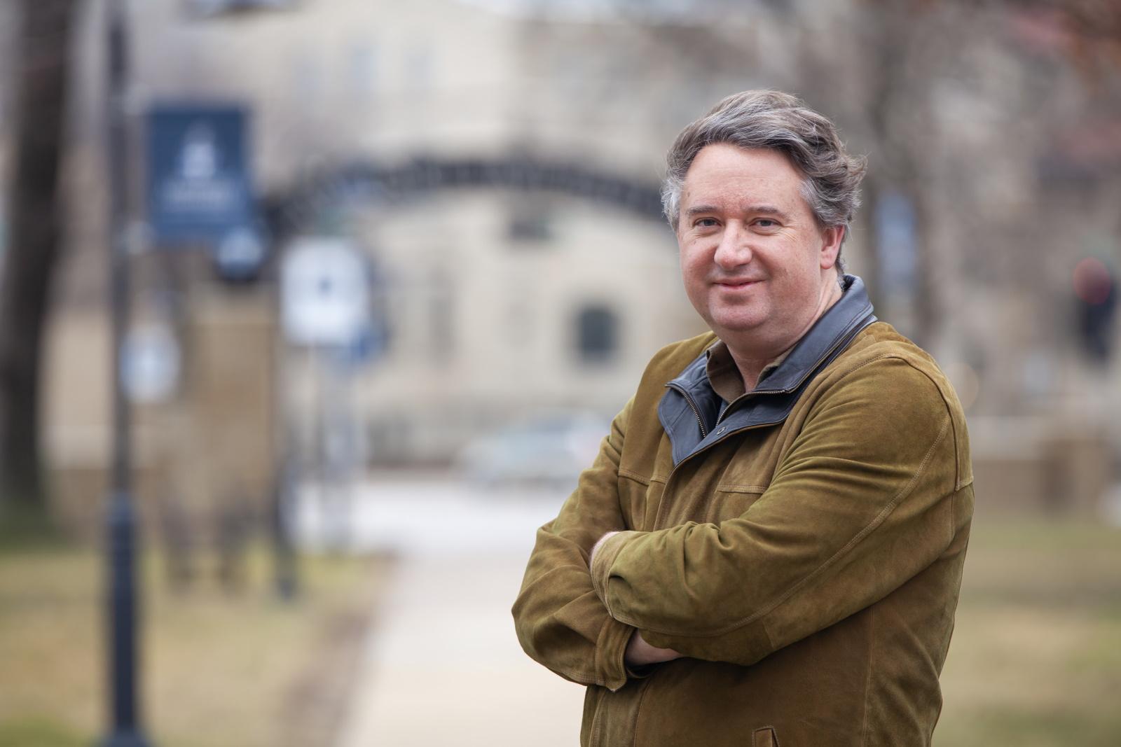 Martyn Smith poses for a photo on Main Hall Green.
