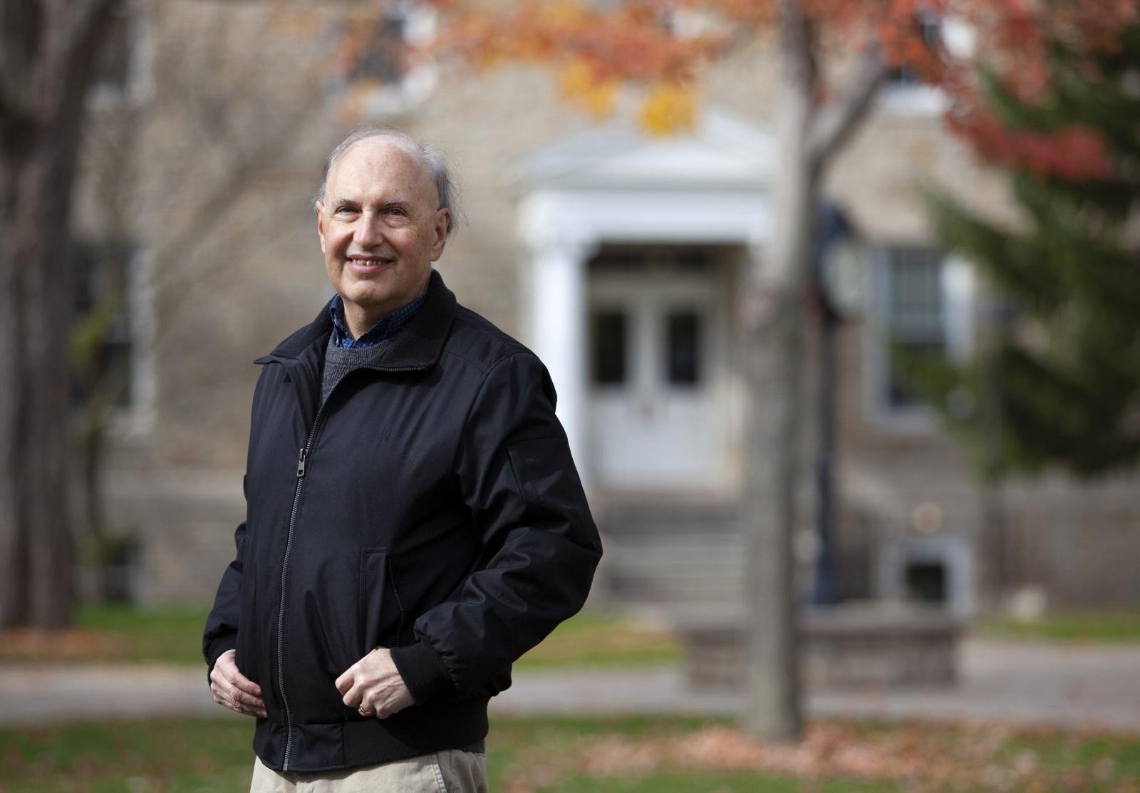 Jerald Podair poses for a photo on Main Hall Green.