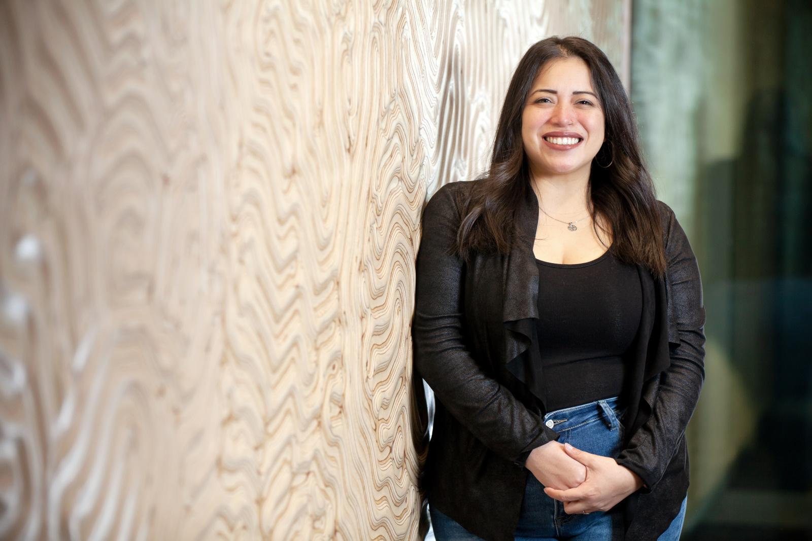 Noemi Delgado poses for a portrait in the hallway of the Center for Academic Success on the second floor of Mudd Library.