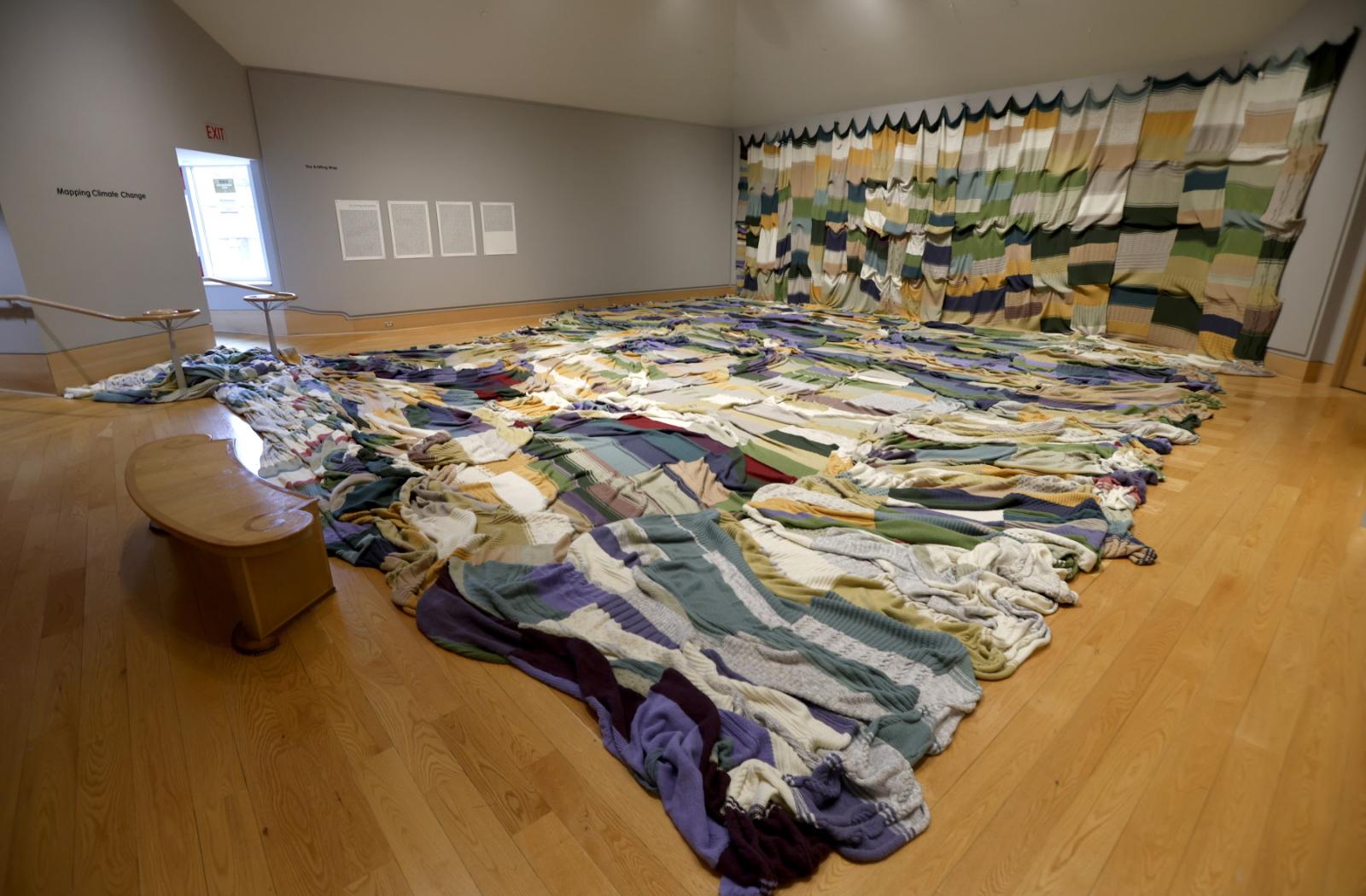 Mapping Climate Change covers one wall and much of the floor in the Kohler Gallery.