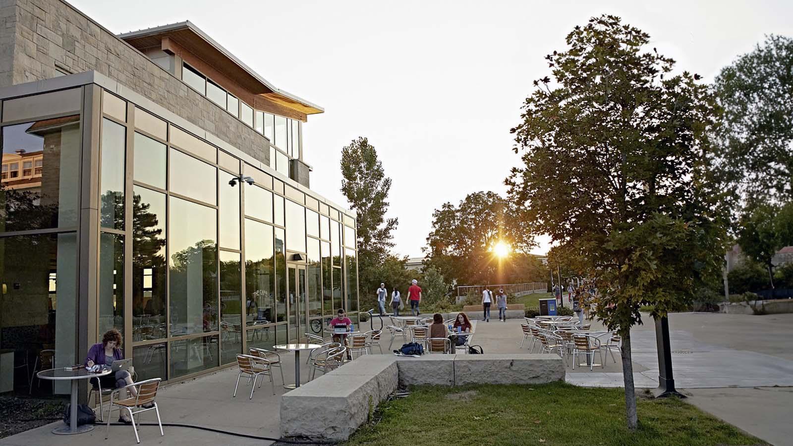 Students on Warch patio at twilight