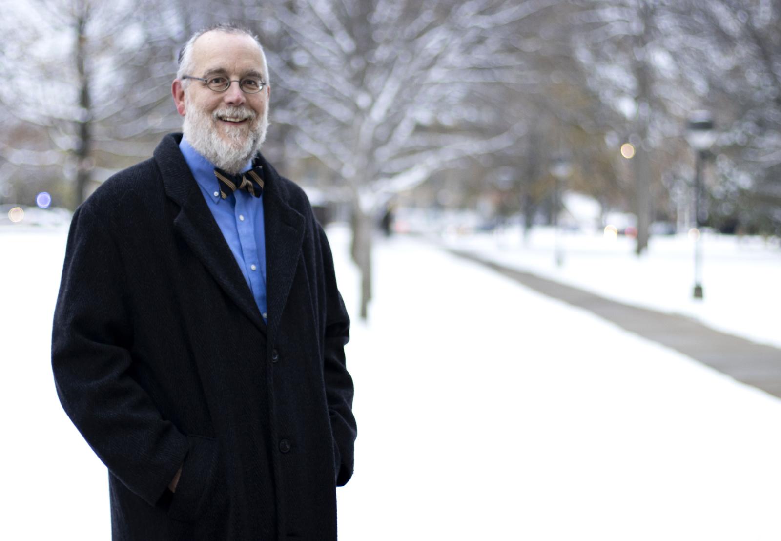 Tim Spurgin poses for a portrait on Main Hall Green.
