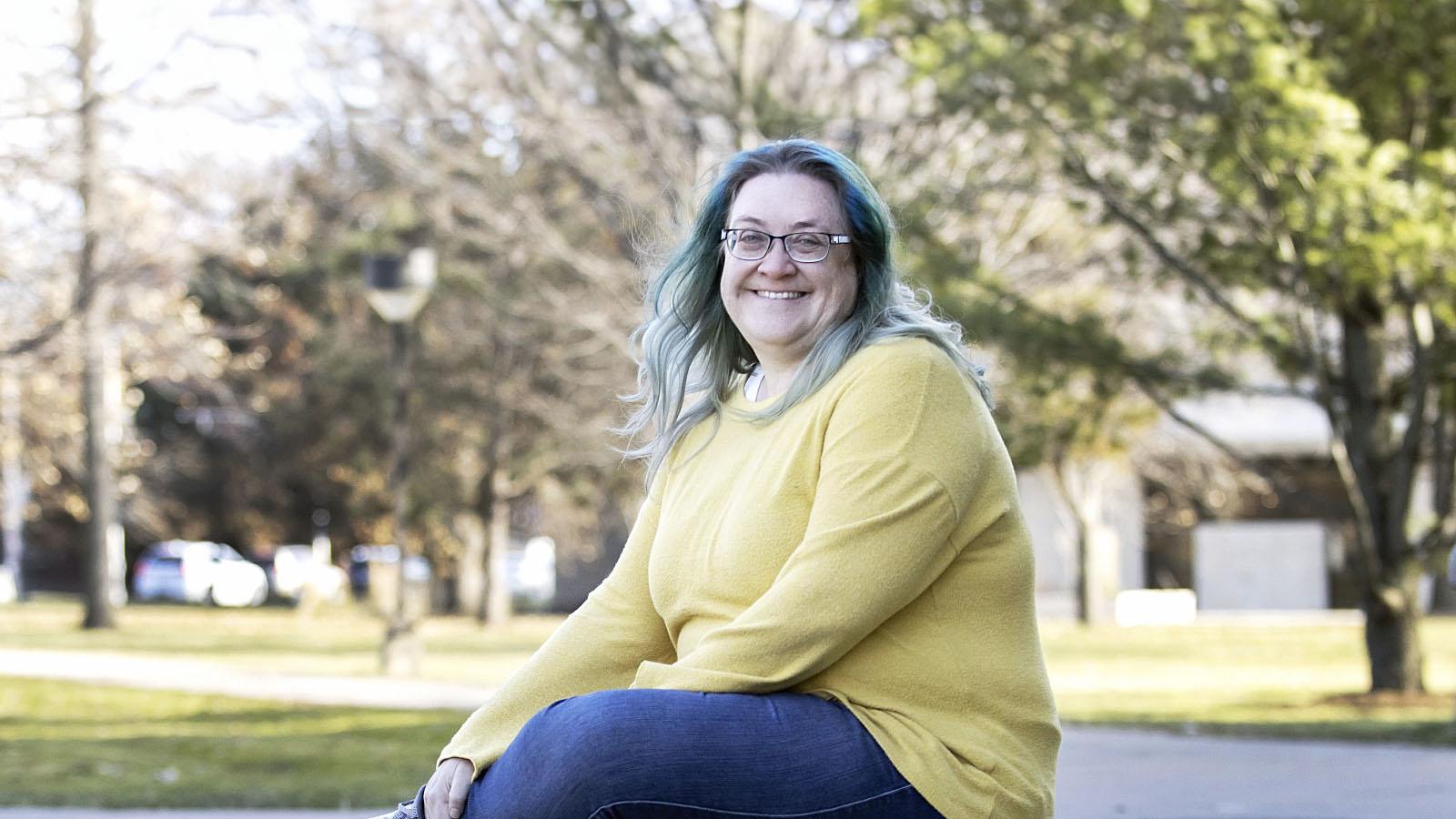 Deanna Donohoue poses for a photo on Main Hall Green.