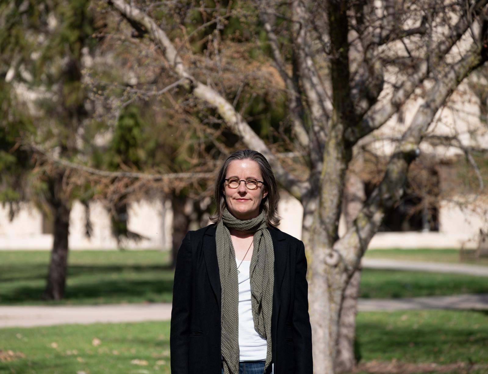 Jodi Sedlock poses for a photo on Main Hall Green.