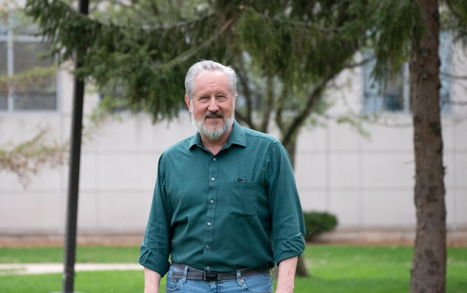 Edmund Kern poses for a photo on Main Hall Green.