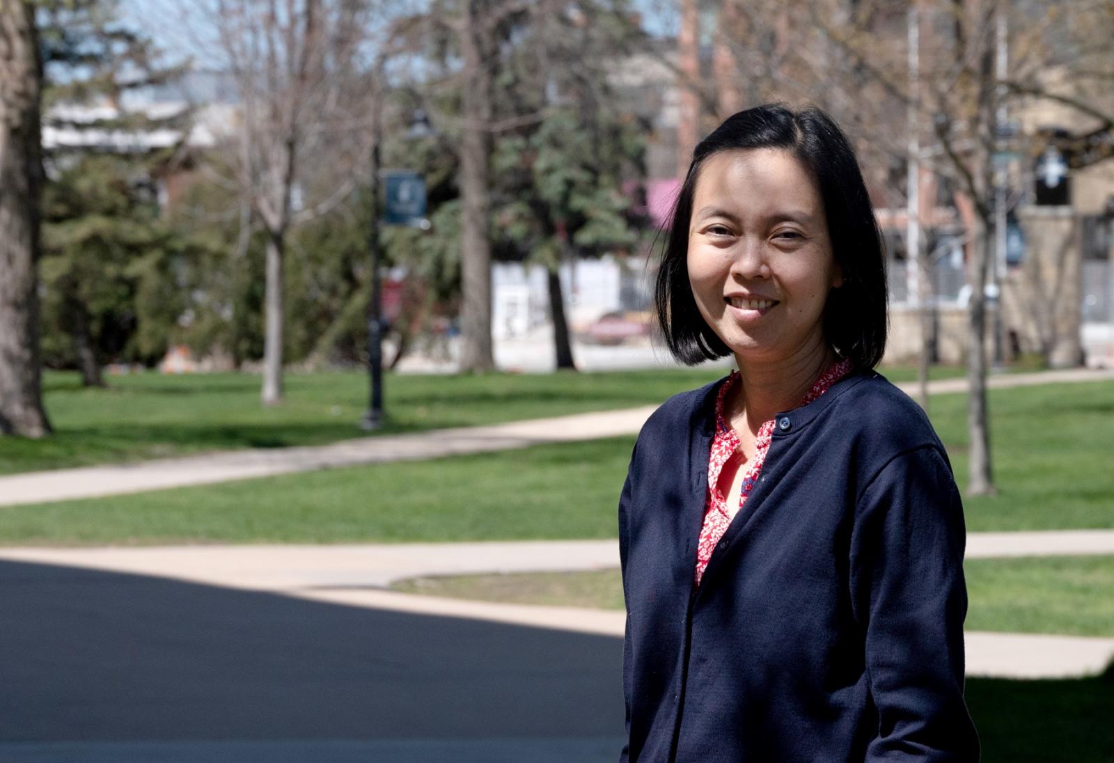 Lena Khor poses for a photo on Main Hall Green.