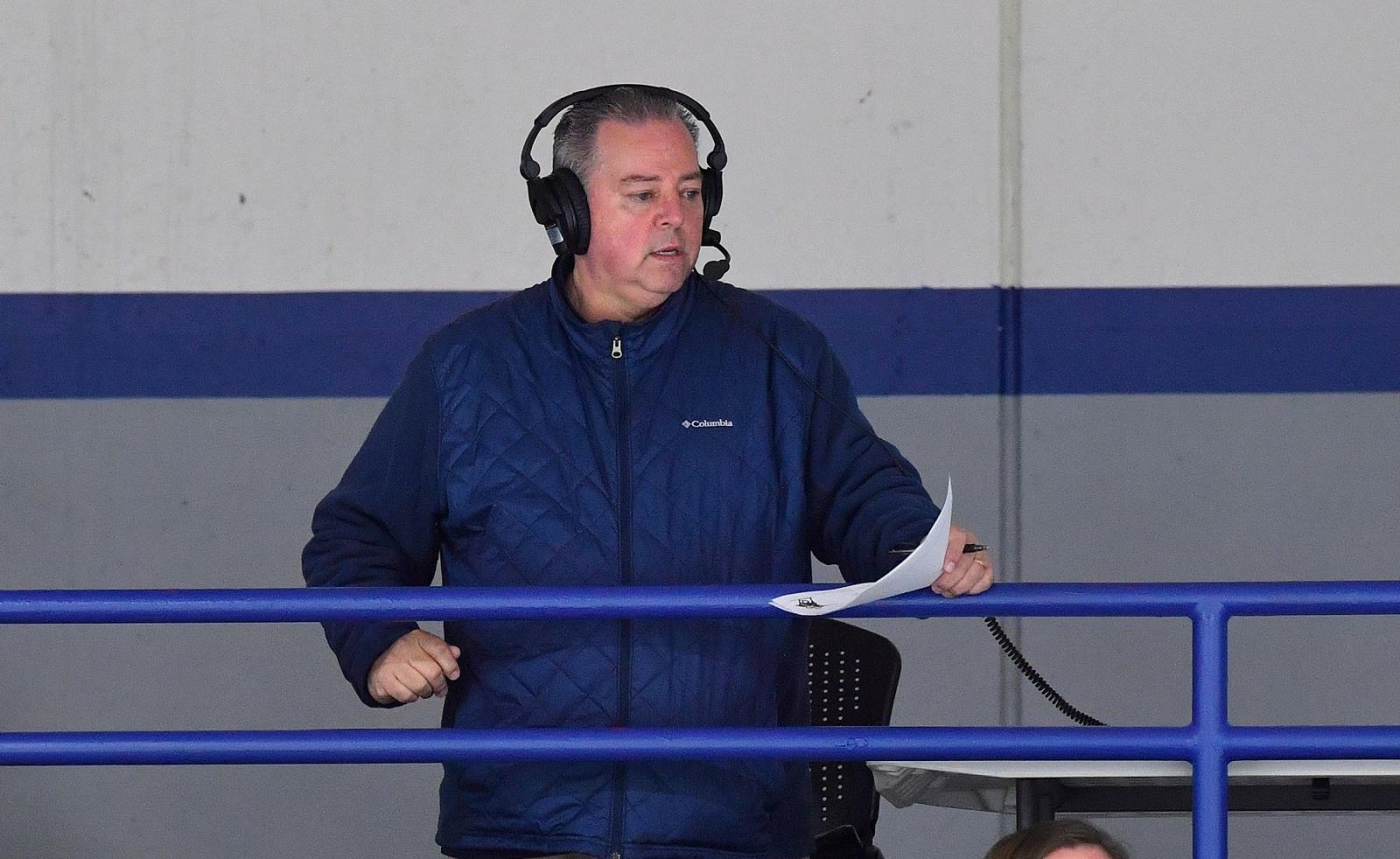Joe Vanden Acker calls a Lawrence hockey game on a webcast. 