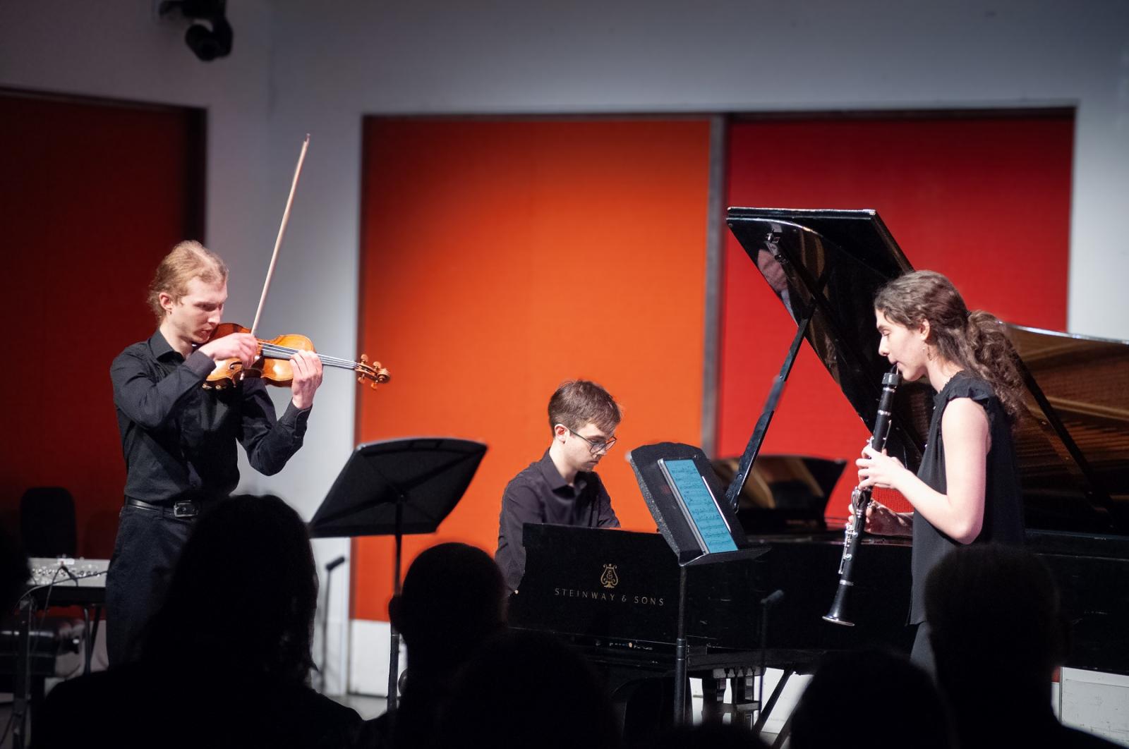 Lawrence students Ben Frueh on violin, Isaac Epley on piano, and Isabelle Olsen on clarinet perform during a recital at Manhattan School of Music in New York City. (Photo by Sarah Pedlar '25)