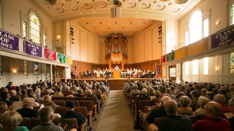 Reunion convocation in Memorial Chapel. Many alum are in attendance 