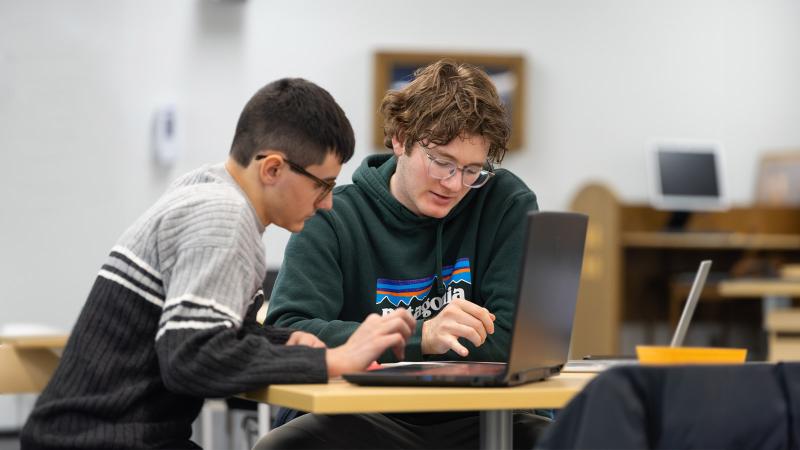 Student being tutored by another student in the Center for Academic Success