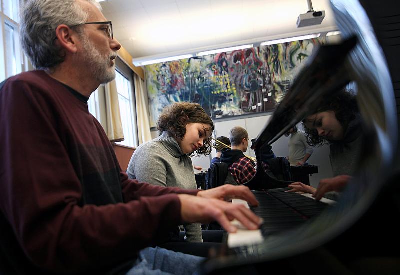 Matthew Turner, jazz improv, faculty practicing piano with student
