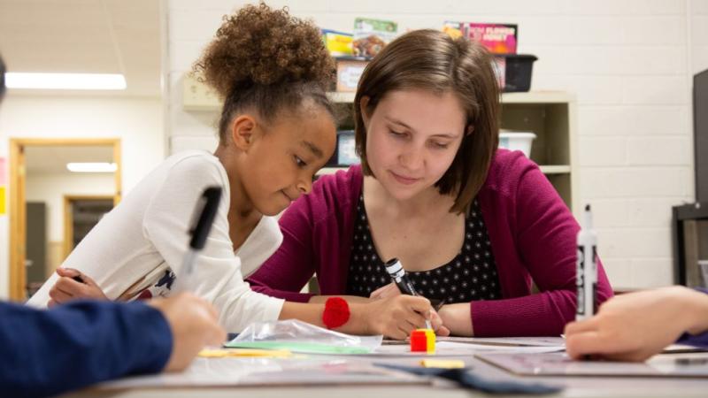 Michelle Gibson works with a student at Appleton’s Lincoln Elementary School.