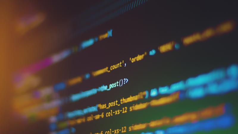 Close up of web code displayed on a monitor
