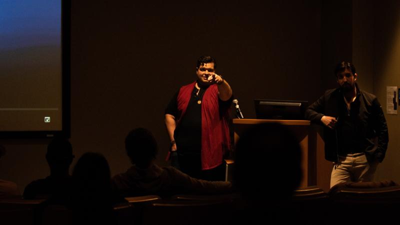 Jacob Dalton '17, theatre major, points to the audience as he talks about filmmaking in Warch Cinema.