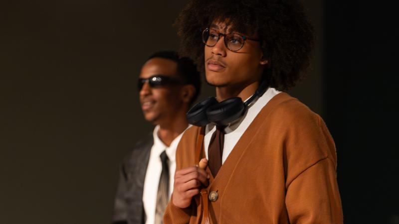 Two students show their fashions.