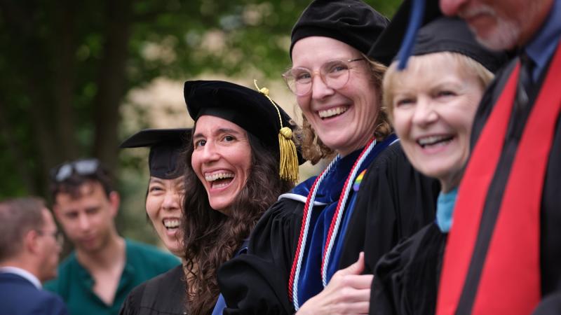 Lena Khor, Sigma Colon, and Betsy Schlabach share a laugh at Commencement.