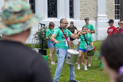 Jean Carlo Urena Gonzalez, assistant professor of music, leads a Brazilian samba drumming workshop at Mile of Music.