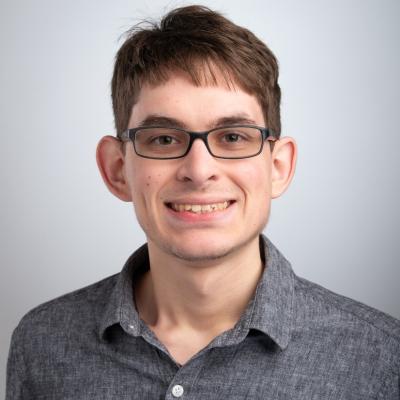 Portrait of AJ Hasselquist, Assistant Director of Advancement Communications