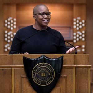 Alexandra Bell stands at the podium on the stage of Memorial Chapel as she delivers her convocation address.